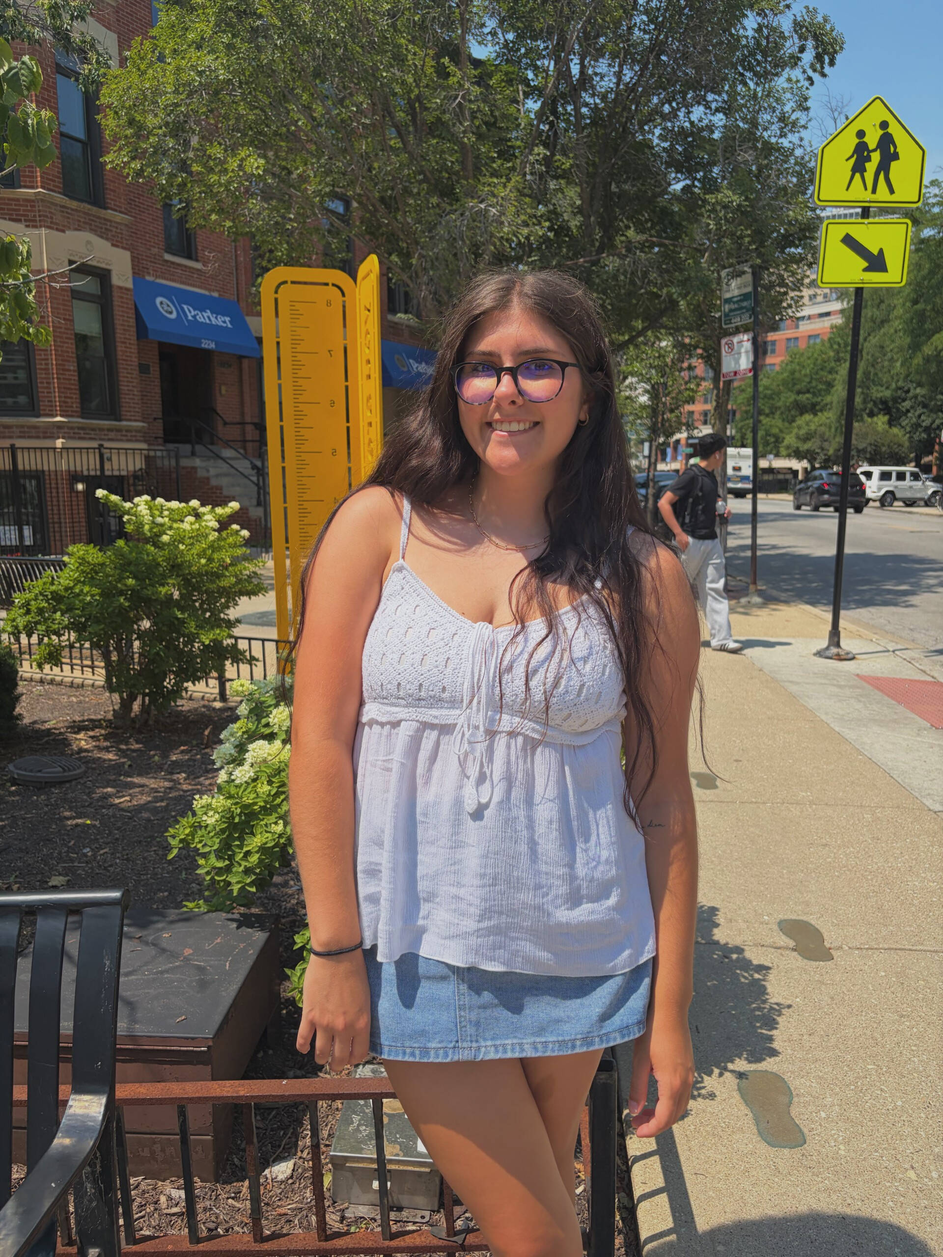 Emma posing on a street